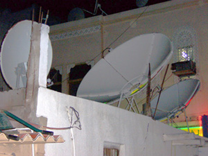 Channel choice: rooftop satellite dishes in the old town of Dubai, UAE